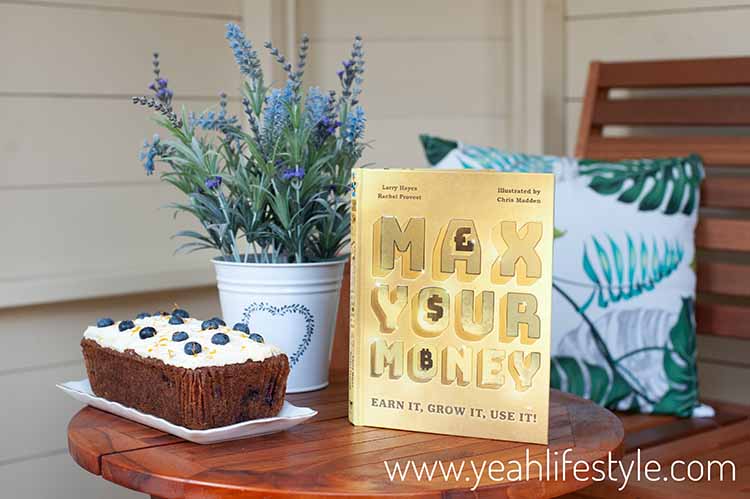 Max Your Money Book on Table in Summer House with Cake